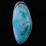 Pendant with Blue/green Chrysocolla clouds in chalcedony set in sterling silver. 