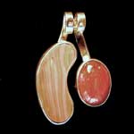 Banded jasper pendant with oval cabochon 